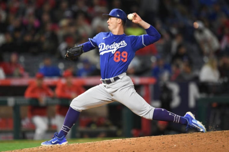 Ben Harris pitching in a Los Angeles Dodgers uniform at Angel Stadium