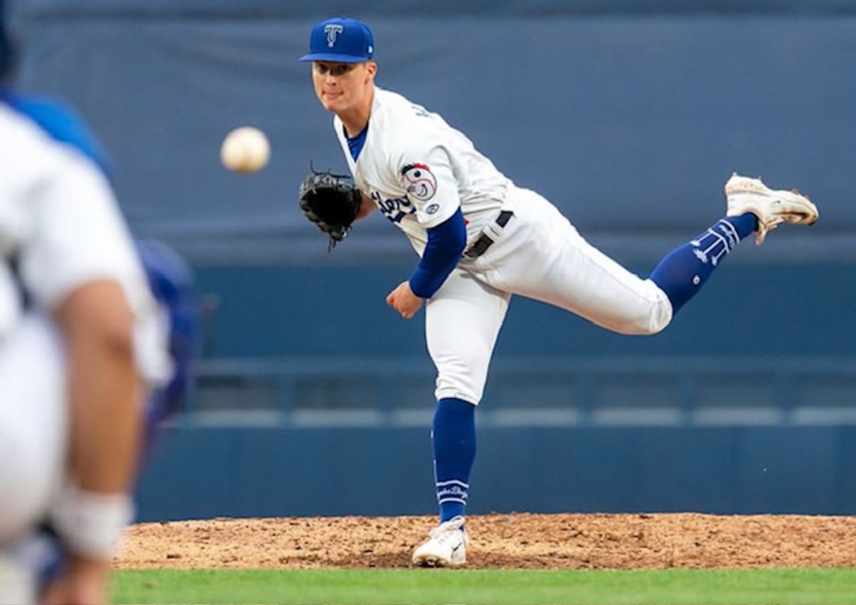 Ben Harris pitching for the Tulsa Drillers, ball in flight